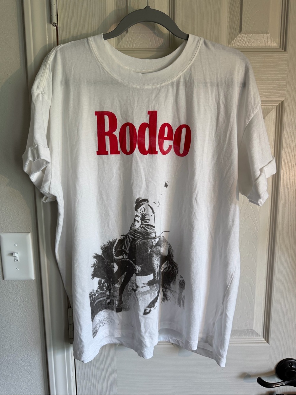 White Rodeo Graphic Tee with Red Logo